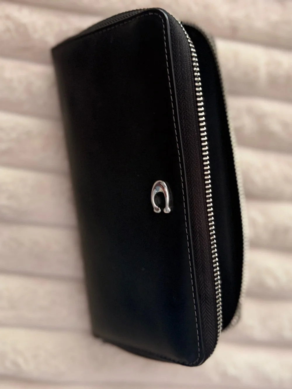 Coach slim zip